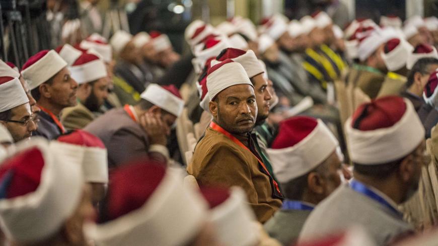 Egyptian Sunni Muslim clerics  attend a conference on extremism at Al-Azhar in Cairo on December 3, 2014. Al-Azhar, one of the most prestigious centres of Sunni Muslim learning, is holding a two-day conference on "Fighting Extremism and Terrorism."AFP PHOTO / KHALED DESOUKI        (Photo credit should read KHALED DESOUKI/AFP/Getty Images)
