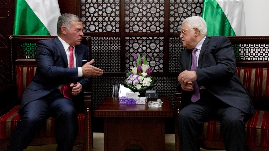 Palestinian President Mahmoud Abbas meets with Jordan's King Abdullah II in the West Bank city of Ramallah August 7, 2017. REUTERS/Nasser Nasser/Pool - RTS1AR22