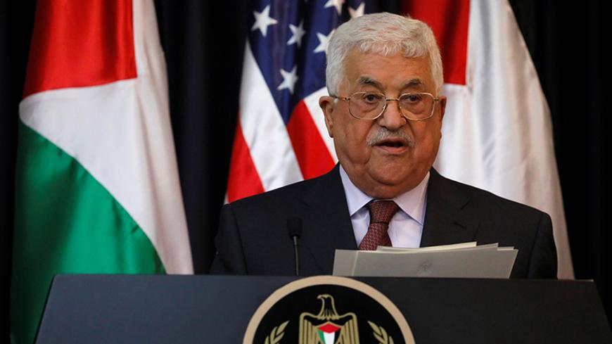 Palestinian President Mahmoud Abbas delivers remarks alongside U.S. President Donald Trump after their meeting at the Presidential Palace in the West Bank city of Bethlehem May 23, 2017. REUTERS/Jonathan Ernst - RTX375K5