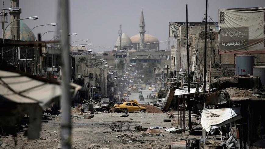 A view of a part of western Mosul, Iraq, May 29, 2017. Alkis Konstantinidis: "It was the second day of my assignment in Mosul and we were driving to join the Iraqi Federal Police forces at their frontline positions. The closer we got to our destination, the more obvious was the impact of the constant warfare. The cityscape was apocalyptic: demolished buildings, burnt cars tipped onto their sides, twisted masses of steel. We reached the frontline on what seemed a quiet day. But even if things appear calm, yo
