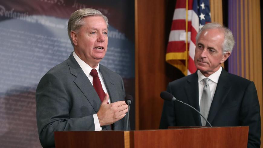 WASHINGTON, DC - AUGUST 03: Sen. Lindsey Graham (R-SC) speaks about the Taylor Force Act while flanked by Sen. Bob Corker (R-TN) during a news conference August 3, 2017 on Capitol Hill in Washington, DC. The legislation would stop economic aid to the Palestinian Authority until it halted payments to people who commit terrorist acts or payments to their families. (Photo by Mark Wilson/Getty Images)