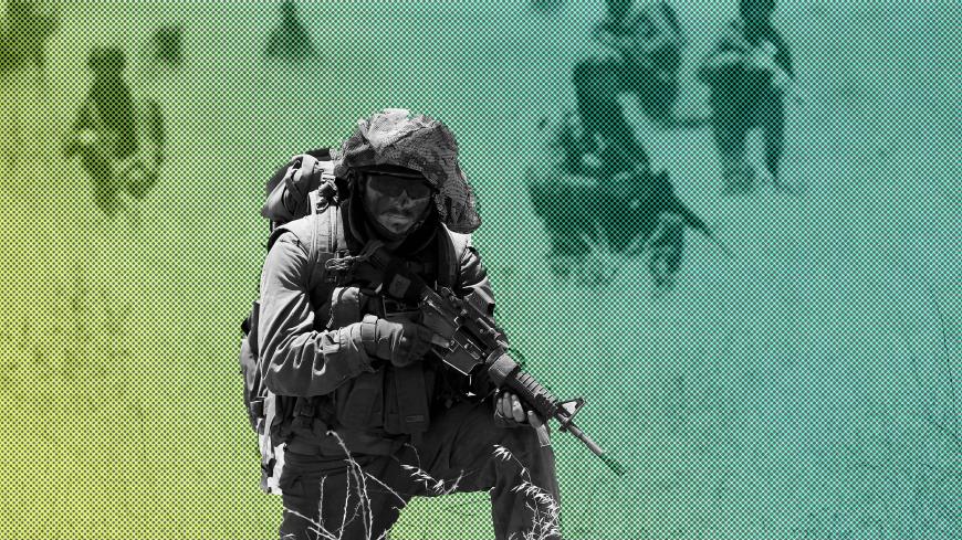 Israeli soldiers from the 605 Combat Engineering Corps battalion take part in a training session on the Israeli side of the border between Syria and the Israeli-occupied Golan Heights June 1, 2016. REUTERS/Baz Ratner/File Photo - D1AETZOHRRAA