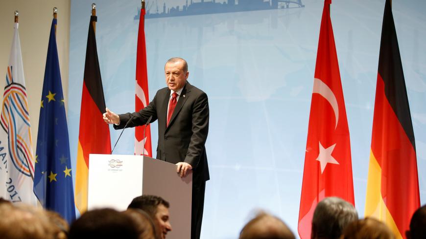 Turkish President Recep Tayyip Erdogan speaks during a news conference to present the outcome of the G20 leaders summit in Hamburg, Germany July 8, 2017. REUTERS/Axel Schmidt - RC16DD9E0310
