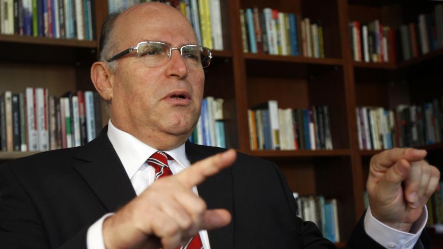 Uzi Arad, a senior adviser to Israel's prime minister-designate Benjamin Netanyahu, speaks during an interview with Reuters in Tel Aviv March 12, 2009. Netanyahu will likely shelve recently revived Israeli peace talks with Syria given its territorial demands and alliance with Iran, Arad said on Thursday. REUTERS/Gil Cohen Magen (ISRAEL POLITICS) - GM1E53D09JW01