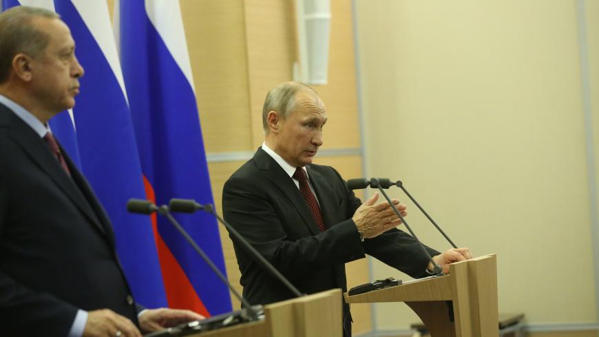 SOCHI, RUSSIA - NOVEMBER 13:  (RUSSIA OUT)  Russian President Vladimir Putin (R) and Turkish President Recep Tayyip Erdogan (L) attend joint press conference after their meeting November 13, 2017 in Sochi, Russia. Erdogan is having a one-day visit to Russiian Black Sea resort of Sochi. Photo by Mikhail Svetlov/Getty Images)