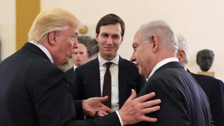Israel's Prime Minister Benjamin Netanyahu and U.S. President Donald Trump chat as White House senior advisor Jared Kushner is seen in between them, during their meeting at the King David hotel in Jerusalem May 22, 2017. Kobi Gideon/Courtesy of Government Press Office/Handout via Reuters THIS PICTURE WAS PROVIDED BY A THIRD PARTY. FOR EDITORIAL USE ONLY. NOT FOR SALE FOR MARKETING OR ADVERTISING CAMPAIGNS. ISRAEL OUT. NO SALES IN ISRAEL - RC1C12FE5EC0