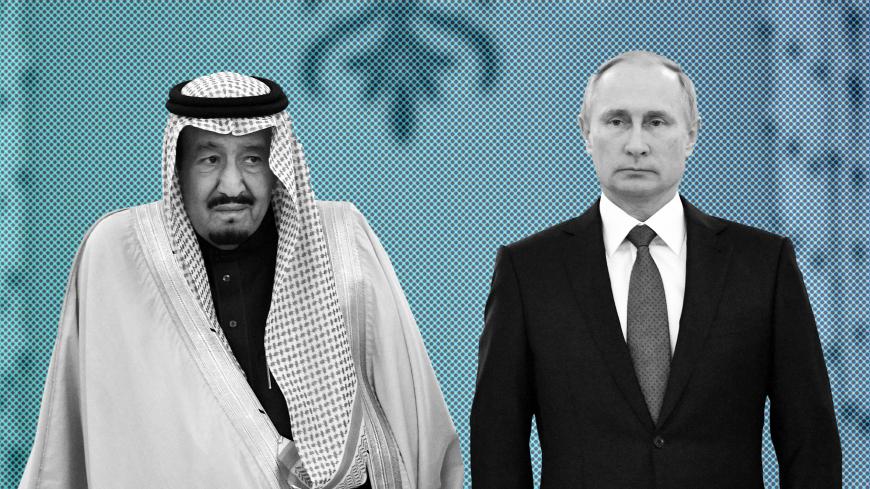 Russian President Vladimir Putin (R) and Saudi Arabia's King Salman attend a welcoming ceremony ahead of their talks in the Kremlin in Moscow, Russia October 5, 2017. Sputnik/Alexei Nikolsky/Kremlin via REUTERS ATTENTION EDITORS - THIS IMAGE WAS PROVIDED BY A THIRD PARTY. - RC1280FB8D90