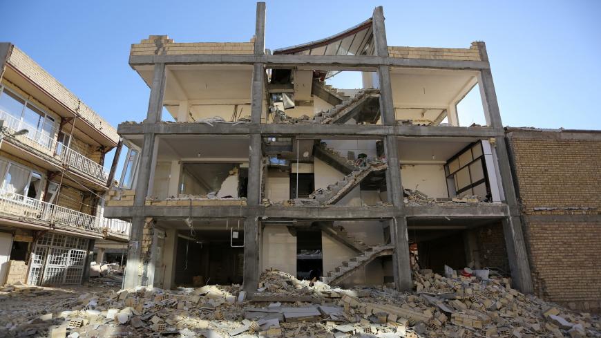 A damaged building is seen following an earthquake in Sarpol-e Zahab county in Kermanshah, Iran November 13, 2017. REUTERS/Tasnim News Agency  ATTENTION EDITORS - THIS PICTURE WAS PROVIDED BY A THIRD PARTY. - RC1DA9F5AB00