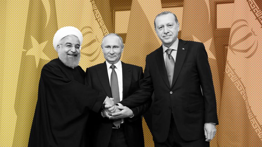 Iran's President Hassan Rouhani, Russia's Vladimir Putin and Turkey's Tayyip Erdogan meet in Sochi, Russia November 22, 2017. Sputnik/Mikhail Metzel/Kremlin via REUTERS ATTENTION EDITORS - THIS IMAGE WAS PROVIDED BY A THIRD PARTY. TPX IMAGES OF THE DAY - RC14EE3228D0