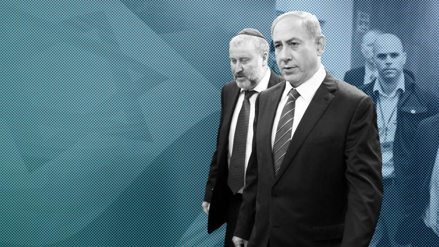 Israeli Prime Minister Benjamin Netanyahu (C) and Cabinet Secretary, Avichai Mandelblit (L) arrive for the weekly cabinet meeting at his office in Jerusalem on September 6, 2015. AFP PHOTO / POOL / MENAHEM KAHANA


        (Photo credit should read MENAHEM KAHANA/AFP/Getty Images)
