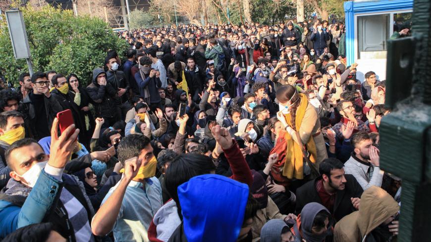 Iranian students protest at the University of Tehran during a demonstration driven by anger over economic problems, in the capital Tehran on December 30, 2017.
Students protested in a third day of demonstrations, videos on social media showed, but were outnumbered by counter-demonstrators.  / AFP PHOTO / STR        (Photo credit should read STR/AFP/Getty Images)