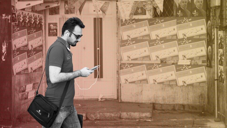 A man uses his smartphone to follow election news in Tehran, Iran May 17, 2017. REUTERS/TIMA ATTENTION EDITORS - THIS IMAGE WAS PROVIDED BY A THIRD PARTY. FOR EDITORIAL USE ONLY. - RC18C545D440