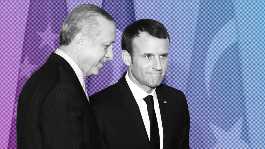 French President Emmanuel Macron (R) and Turkish President Recep Tayyip Erdogan walk out  after a joint press conference at the Elysee Palace in Paris, France, January 5, 2018. REUTERS/Ludovic Marin/Pool - RC1B3603AB90
