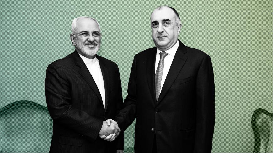 Azerbaijan's Foreign Minister Elmar Mammadyarov (R) meets with his Iranian counterpart Mohammad Javad Zarif in Baku on December 20, 2017.
Foreign Ministers of Azerbaijan, Iran and Turkey hold the fifth trilateral meeting in Baku. / AFP PHOTO / Tofik BABAYEV (Photo credit should read TOFIK BABAYEV/AFP/Getty Images)