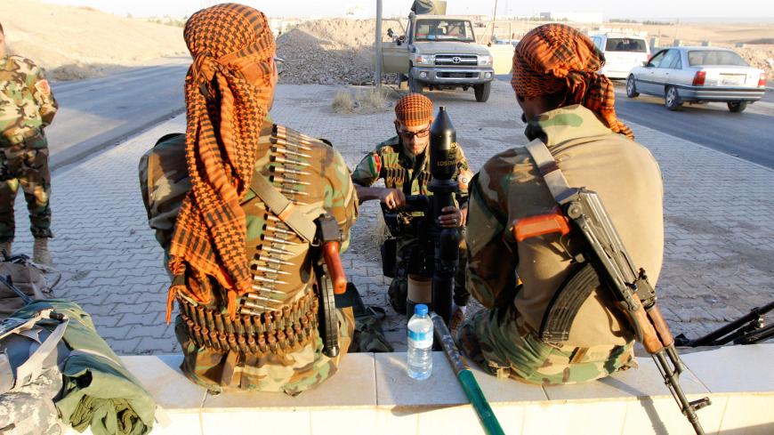 Kurdish Peshmerga fighters gather north of Kirkuk, Iraq October 19, 2017. REUTERS/Ako Rasheed - RC1244BF1E20