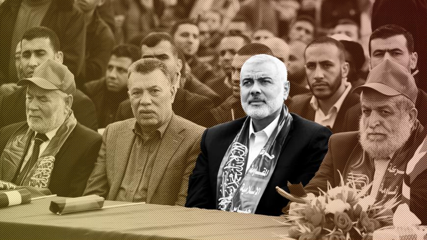 Hamas Chief Ismail Haniyeh (2nd R) attends a rally marking the 30th anniversary of Hamas' founding, in Gaza City December 14, 2017. REUTERS/Mohammed Salem - RC17C6C8A1E0