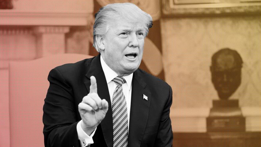 U.S. President Donald Trump declares his opposition to domestic violence during a working session regarding the Opportunity Zones provided by tax reform in the Oval Office of the White House in Washington, U.S., February 14, 2018.      REUTERS/Joshua Roberts - RC11BECC88B0