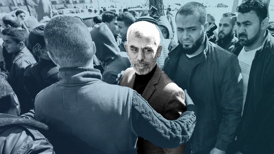 Yahya Sinwar (C), the new leader of Hamas in the Gaza Strip, arrives for the opening of a new mosque in Rafah town in the southern Gaza Strip on February 24, 2017. / AFP / SAID KHATIB (Photo credit should read SAID KHATIB/AFP/Getty Images)