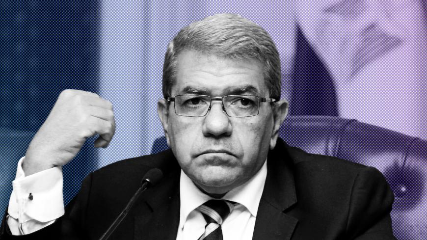 Finance Minister Amr El-Garhy at a news conference in Cairo, Egypt August 11, 2016. REUTERS/Mohamed Abd El Ghany - S1BETUVOVSAA