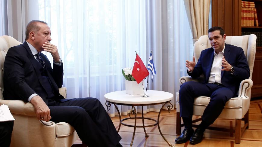 Greek Prime Minister Alexis Tsipras meets with Turkish President Tayyip Erdogan at the Maximos Mansion in Athens, Greece December 7, 2017. REUTERS/Costas Baltas - RC1BFA6480B0