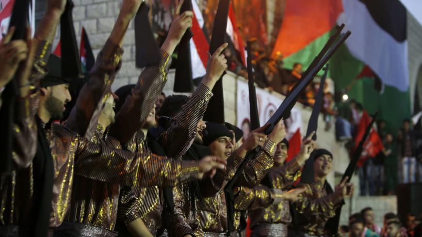 Palestinians take part in a party on the occasion of the 49th anniversary of the creation of the Popular Front for the Liberation of Palestine on December 12, 2016, south of Nablus. / AFP / JAAFAR ASHTIYEH        (Photo credit should read JAAFAR ASHTIYEH/AFP/Getty Images)