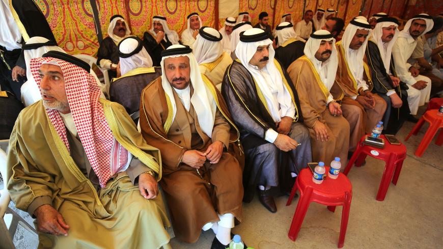 Tribal leaders gather for a meeting in Mosul on August 30, 2017 to discuss the security situation after Iraqi forces reseized the city from the Islamic State (IS) group in July. 
Iraqi troops backed by a US-led international coalition routed IS in Mosul in July after a gruelling nine-month fight for Iraq's second city. / AFP PHOTO / AHMAD AL-RUBAYE        (Photo credit should read AHMAD AL-RUBAYE/AFP/Getty Images)