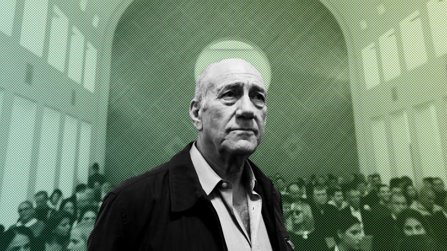Former Israeli prime minister Ehud Olmert is seen in the court room as he waits for the judges at the Supreme Court in Jerusalem December 29, 2015. Israel's top court slashed Olmert's prison sentence to 18 months from six years on Tuesday after overturning the main count in his 2014 bribery conviction. Olmert, 70, will begin serving his term on Feb. 15, according to live reports from the Jerusalem courtroom, making him the first former head of government in Israel to go to prison. REUTERS/Gali Tibbon/Pool  