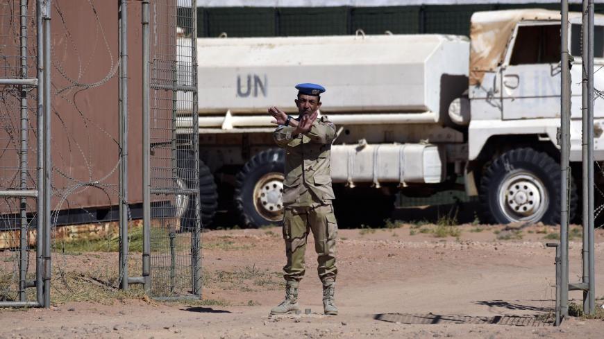 A member of the United Nations peace mission MINURSO gestures during a visit of the UN chief at a UN base in Bir-Lahlou, in the disputed territory of Western Sahara, situated 220 kilometres (137 miles) southwest of the Algerian town of Tindouf, on March 5, 2016. / AFP / Farouk Batiche (Photo credit should read FAROUK BATICHE/AFP/Getty Images)