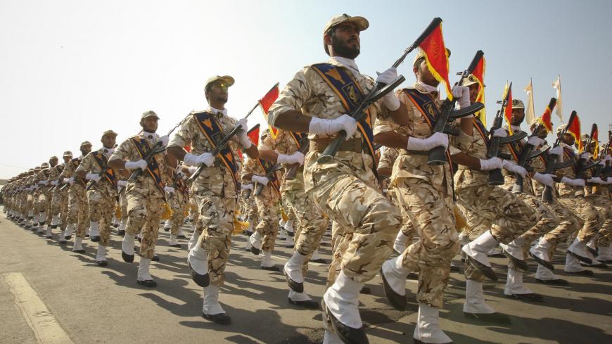 EDITORS' NOTE: Reuters and other foreign media are subject to Iranian restrictions on their ability to report, film or take pictures in Tehran. 

Members of the Iranian revolutionary guard march during a parade to commemorate the anniversary of the Iran-Iraq war (1980-88), in Tehran September 22, 2011. REUTERS/Stringer (IRAN - Tags: POLITICS MILITARY ANNIVERSARY) - GM1E79M1GMB01