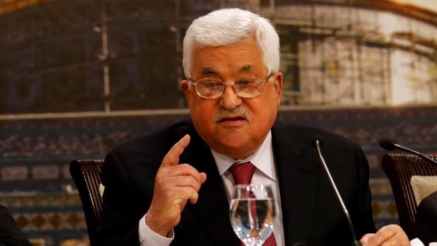 Palestinian President Mahmoud Abbas gestures as he speaks during the Palestinian National Council meeting in Ramallah, in the occupied West Bank April 30, 2018. REUTERS/Mohamad Torokman - RC1C77882100
