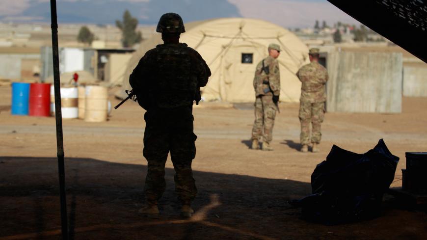 A U.S. soldier from the 2nd Brigade, 82nd Airborne Division stands guard at a military base north of Mosul, Iraq, February 14, 2017. Picture taken February 14, 2017. REUTERS/Khalid al Mousily - RC1D165D9880