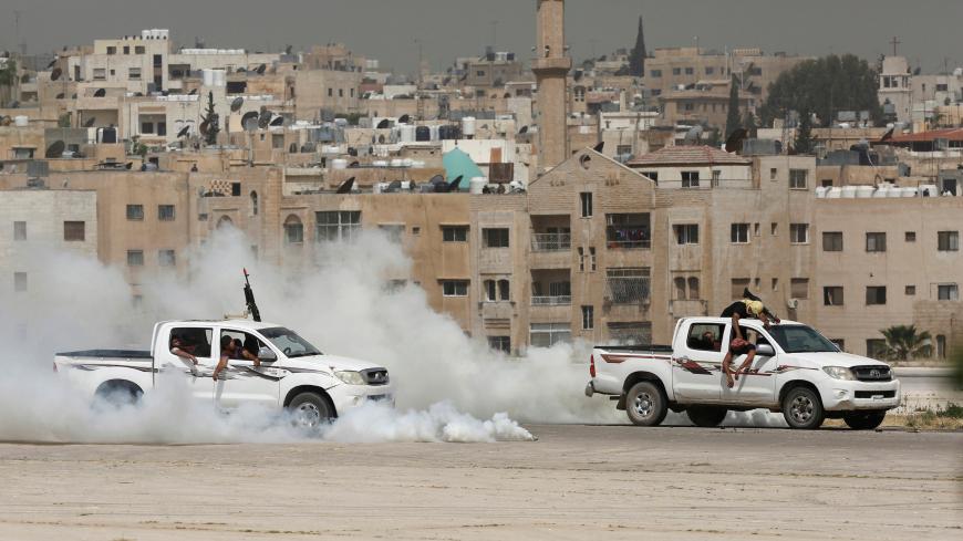 Jordanian special forces participate in an anti-terrorism drill during the opening of the Special Operation Forces Exhibition (SOFEX) at King Abdullah II Airbase in Amman, Jordan, May 10, 2016. REUTERS/Muhammad Hamed - S1BETDGKKEAA