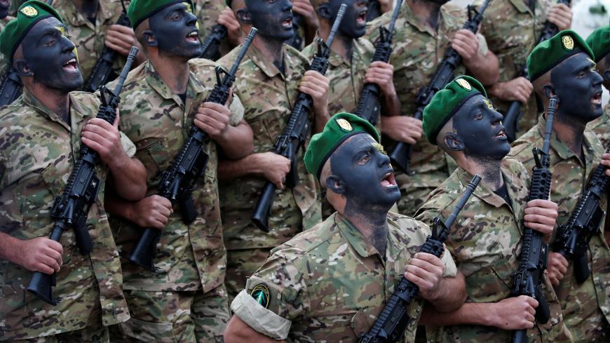 Lebanese army soldiers take part in a military parade to celebrate the 74th anniversary of Lebanon's independence in downtown Beirut, Lebanon November 22, 2017. REUTERS/Mohamed Azakir - RC14B8891980