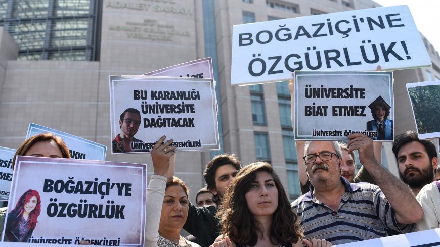 People demonstrate outside the Caglayan courthouse on June 6, 2018 in Istanbul with banners reading "Freedom for Bogazici" as a trial opens today of 21 students from Bogazici University described by Turkey's President as "terrorists" after they opposed the Turkish military operation in Syria launched in January 2018. (Photo by Yasin AKGUL / AFP) (Photo credit should read YASIN AKGUL/AFP/Getty Images)