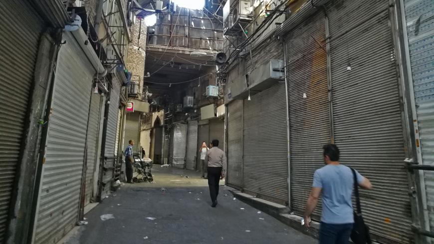 Iranian shop closed at the ancient Grand Bazaar in Tehran on June 25, 2018. - Grand Bazaar shop owners closed their shops on monday in a rare strike movement to protest against the depreciation of the Iranian currency. (Photo by ATTA KENARE / AFP)        (Photo credit should read ATTA KENARE/AFP/Getty Images)