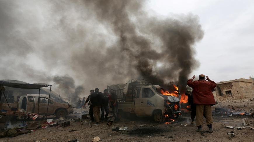 Smoke rises after a car bomb explosion in Jub al Barazi east of the northern Syrian town of al-Bab, Syria January 15, 2017. REUTERS/Khalil Ashawi - RC191C4F8A90