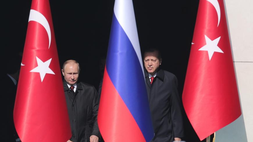 Turkish President Tayyip Erdogan and his Russian counterpart Vladimir Putin meets at the Presidential Palace in Ankara, Turkey April 3, 2018. REUTERS/Umit Bektas - UP1EE431A7CYB