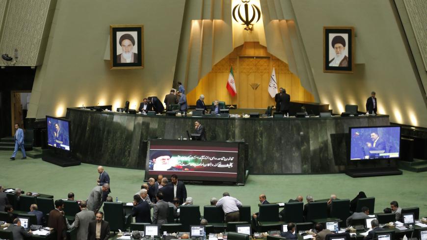 Iranian MPs are seen during a meeting of the Iranian parliament for the impeachment of the Minister of Labor on March 13, 2018. / AFP PHOTO / ATTA KENARE        (Photo credit should read ATTA KENARE/AFP/Getty Images)