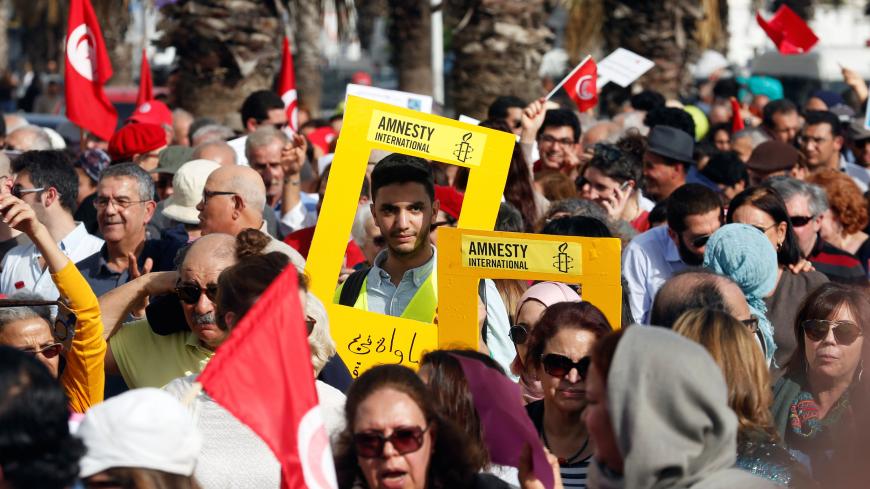 Protesters shout slogans during a march, demanding equal inheritance rights for women, in Tunis, Tunisia March 10, 2018.REUTERS/Zoubeir Souissi - RC15A0814AC0