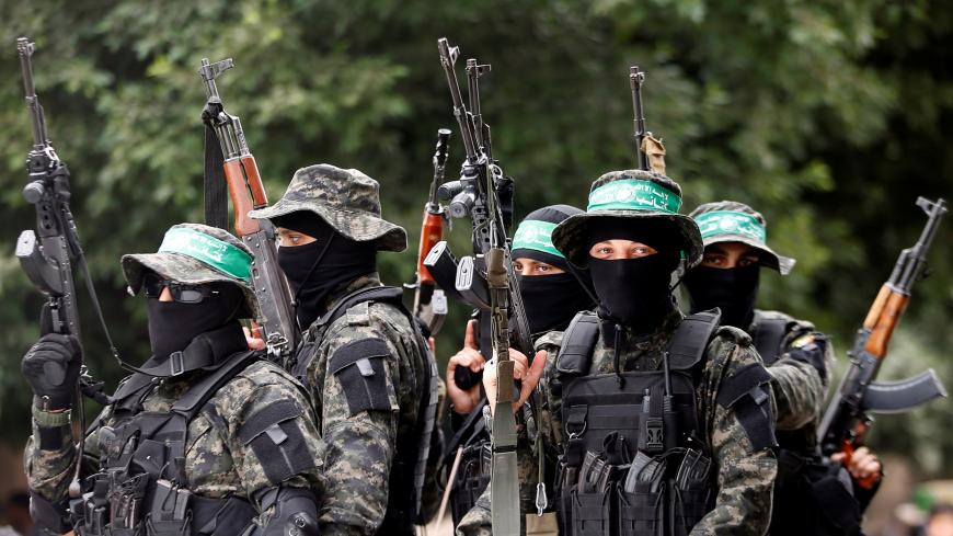 Palestinian Hamas militants attend the funeral of their comrade Mahmoud al-Qeshawi who was killed in an explosion, in Gaza city May 6, 2018.  REUTERS/Mohammed Salem - RC1C01650C70