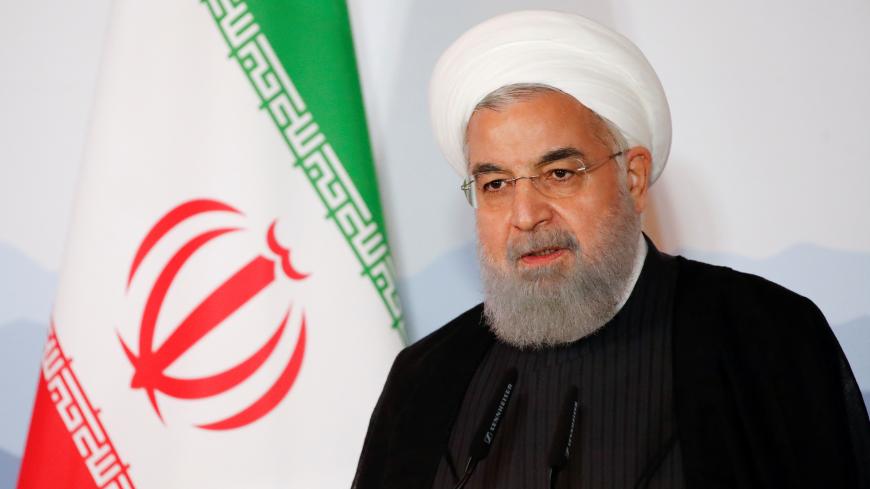 Iranian President Hassan Rouhani addresses the Innovation and Industry Forum during an official visit in Bern, Switzerland, July 3, 2018. REUTERS/Denis Balibouse - RC18019D3390