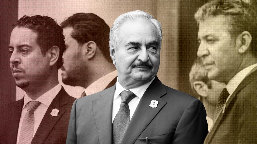 Khalifa Haftar (C), the military commander who dominates eastern Libya, leaves after an international conference on Libya at the Elysee Palace in Paris, France, May 29, 2018.  REUTERS/Philippe Wojazer - RC1C86F2EC00