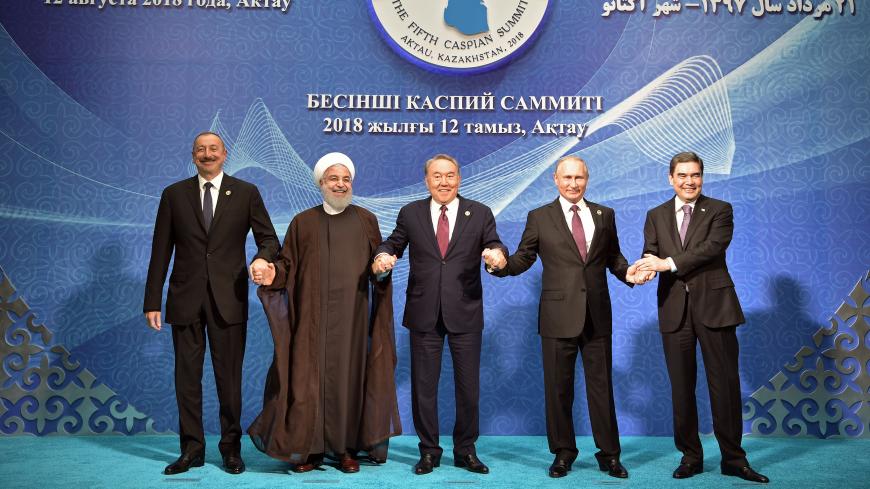 Azeri President Ilham Aliyev, Iranian President Hassan Rouhani, Kazakh President Nursultan Nazarbayev, Russian President Vladimir Putin and Turkmen President Kurbanguly Berdymukhamedov  pose for a family photo during the Fifth Caspian Summit in Aktau, Kazakhstan August 12, 2018.  Sputnik/Alexei Nikolsky/Kremlin via REUTERS ATTENTION EDITORS - THIS IMAGE WAS PROVIDED BY A THIRD PARTY. - UP1EE8C1E9DPM