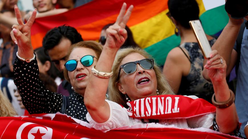 Protesters shout slogans during a rally, demanding equal inheritance rights for women, in Tunis, Tunisia August 13, 2018. REUTERS/Zoubeir Souissi      TPX IMAGES OF THE DAY - RC1BEC04FF70