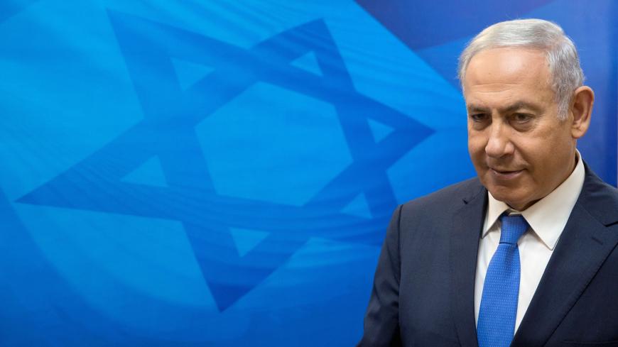 Israeli Prime Minister Benjamin Netanyahu arrives to the weekly cabinet meeting at the Prime Minister's office in Jerusalem,  July 29, 2018. Sebastian Scheiner /Pool via Reuters *** Local Caption *** - RC1F49FF0D00