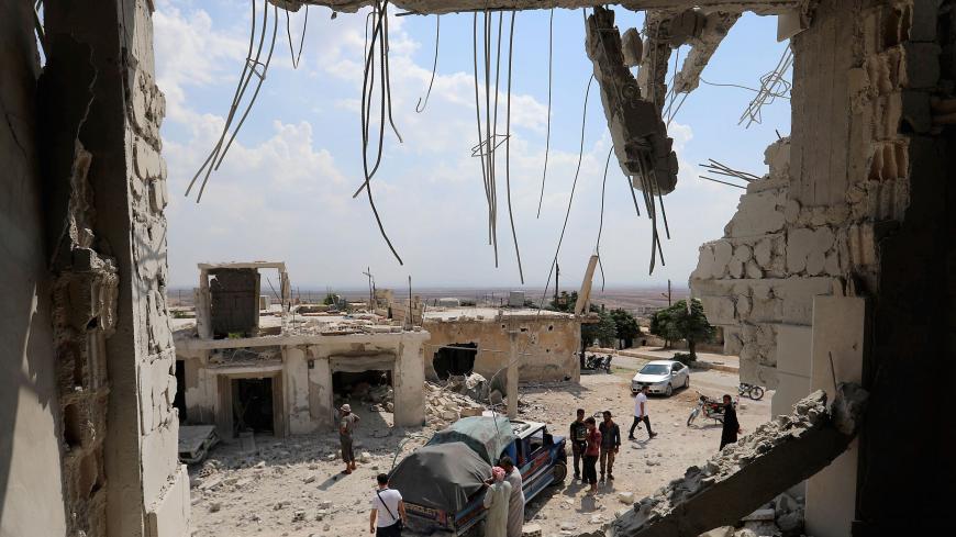 TOPSHOT - This picture shows the destructions after govenrment forces' bombings in the town of Al Habit on the southern edges of the rebel-held Idlib province on September 9, 2018. - Russian air strikes on Syria's last major rebel bastion today were the "most violent" in a month since Damascus and its ally Moscow started threatening it with an imminent attack around a month ago, a monitor said. (Photo by OMAR HAJ KADOUR / AFP) (Photo credit should read OMAR HAJ KADOUR/AFP/Getty Images)