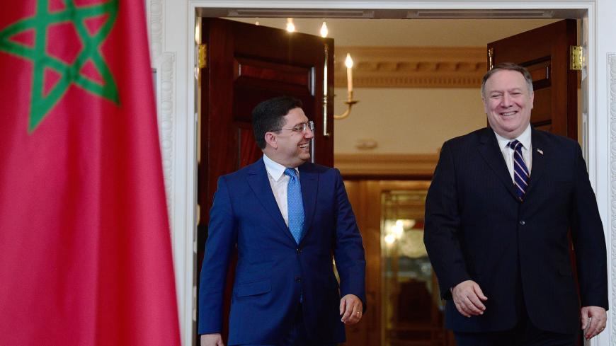Moroccan Foreign Minister Nasser Bourita (L) walks with US Secretary of State Mike Pompeo at the US State Department in Washington, DC, on September 17, 2018. (Photo by Jim WATSON / AFP)        (Photo credit should read JIM WATSON/AFP/Getty Images)