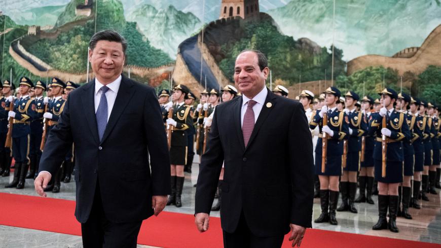China's President Xi Jinping and Egyptian President Abdel Fattah al-Sisi stand near the Chinese People's Liberation Army honour guard during a welcome ceremony at the Great Hall of the People in Beijing, China September 1, 2018. Nicolas Asfouri/Pool via REUTERS - RC19352BDE00