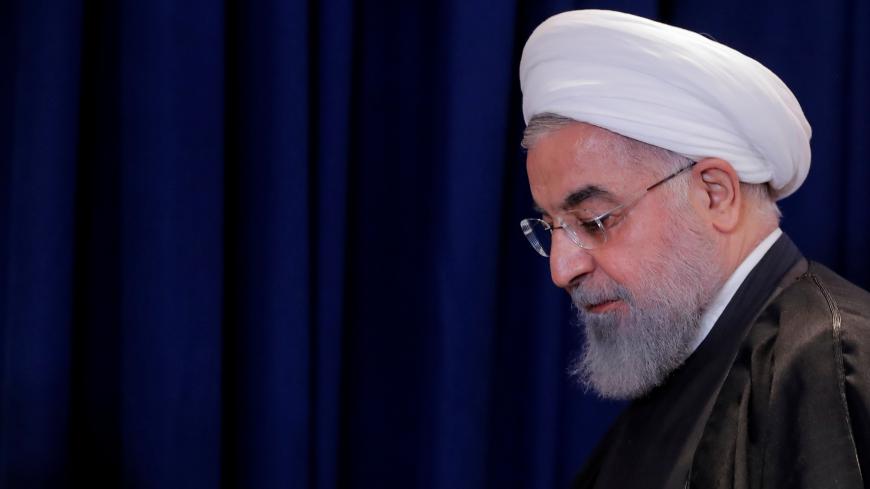 Iran's President Hassan Rouhani exits following a news conference on the sidelines of the 73rd session of the United Nations General Assembly at U.N. headquarters in New York, U.S., September 26, 2018. REUTERS/Brendan Mcdermid - RC189E994530