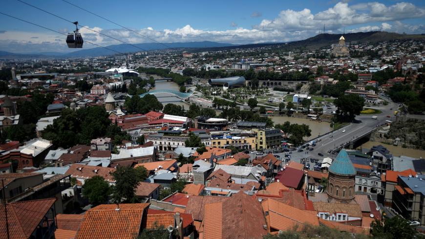 A general view shows the city of Tbilisi, Georgia, June 8, 2016. REUTERS/David Mdzinarishvili - D1AETIXBTSAB